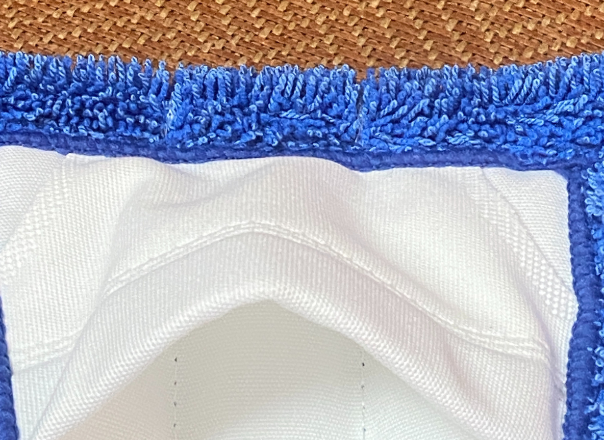Hook & loop backing and pocket construction