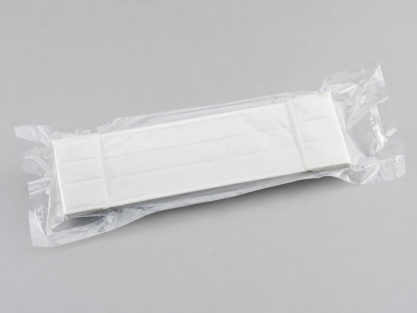 Sterile cleanroom mop pad in double vacuum sealed packaging