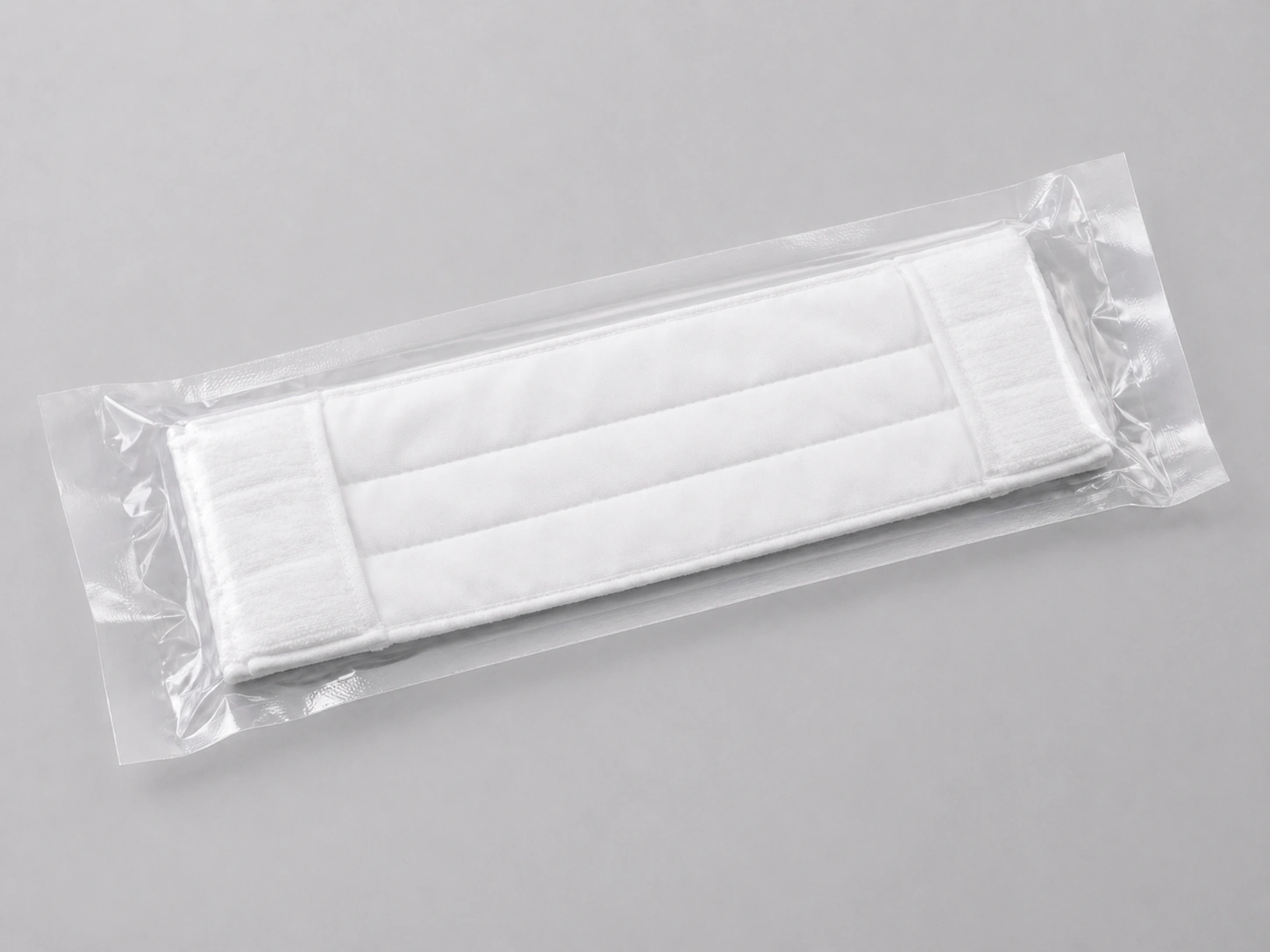 Sterile cleanroom mop pad in double-layer vacuum packaging for controlled environments