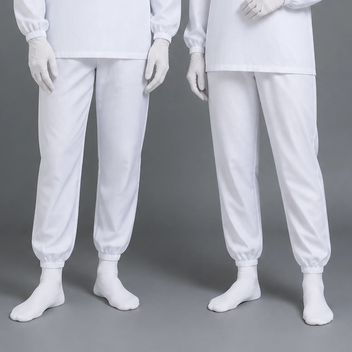 Lower-body detail of the MD-1A01 cleanroom pants continuing into soft connected fabric socks